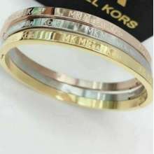 Michael Kors Jewellery Michael Kors Yellow Gold Premium Bangle  Bracelets  from Faith Jewellers UK